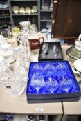 A set of three Continental lead crystal glass candlesticks of graduating sizes, the largest measures