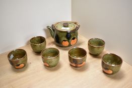 An attractive Japanese Otagiri art pottery teaset, comprising teapot and six tea bowls, each with