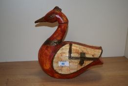 A 20th Century duck decoy style casket, of Eastern appearance with red lacquered body, copper and