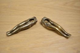 Two pairs of 20th Century novelty brass nut crackers in the form of ladies legs, each measuring 13cm