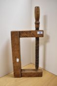 A 19th Century oak carpenter's screw clamp, measuring 55cm high