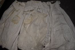 Five late Victorian baby christening gowns and two bonnets including lace work and broidery anglaise