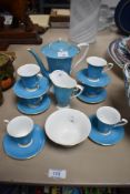 A George V Royal Worcester bone china coffee set, comprising coffee pot, six cups, six saucers,