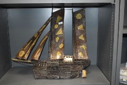 A 20th Century hand crafted wire and metal junk ship wall hanging sculpture, measuring 58cm high