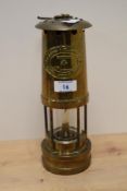 A vintage brass miner's lamp, by E.Thomas & Williams Ltd. Of Aberdare, Wales, measuring 28cm
