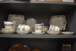 An early 20th Century Fenton china part tea service, of Art Deco style and hand decorated with bands