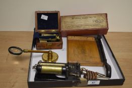 A vintage boxed De Vilbiss Atomer No.15, a Jaynay Trimmer guillotine, an angle poise desk magnifying