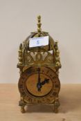 A 20th Century brass Smith's lantern clock, having an eight day movement and stamped 'Smiths