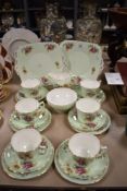 A 1950s H-O & Co. tea set in mint green with gold coloured trim, comprising sandwich plates, tea