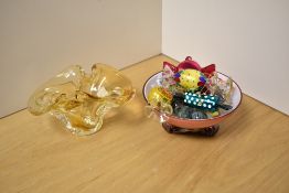 A 20th Century amber coloured art glass vase with ruffle top, measuring 10cm high, an art glass
