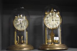 A mid-20th Century Kundo Anniversary Clock, the enamelled foliate patterned and Arabic dial above