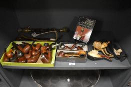A Meerschaum Bacchus pipe, measuring 15cm long and with case, together with a selection of other