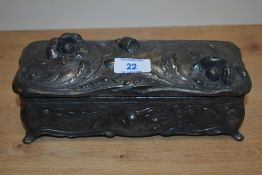 A 19th Century lidded pewter casket, of Art Nouveau design and rectangular in form, measuring 24cm