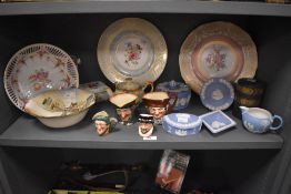 A 20th Century Royal Worcester porcelain cabinet plate decorated with a floral spray within a duck