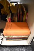 A selection of reading material, to include Bottlescrew Days, Glorious Devon, Horse Play, and a