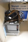 A vintage Triumph portable TV and a Zorki 4K Rangefinder camera