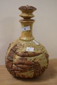 A mid-20th Century Bernard Rooke style studio pottery decanter with stopper, with Brutalist