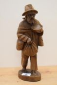 A 20th Century Continental wooden figural ornament, of Folk Art style and depicting an elderly,