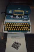 A vintage Imperial 202 typewriter with hard case and instruction manual.