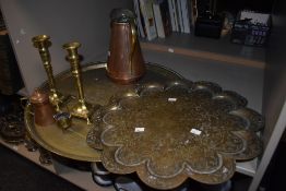 A 19th Century Indian etched brass tray of scalloped outline, measuring 50cm in diameter, a larger