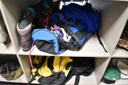 A large amount of high altitude climbing/mountaineering gear to include boots, rucksacks,