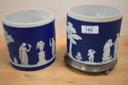 Two 19th century Wedgwood blue Jasper ware biscuit barrels, one with silver plated base mount with