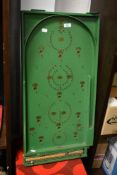 A 1950s Chad Valley bagatelle board game, measuring 76cm long