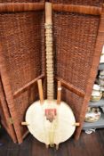 A West African Kora stringed musical instrument, measuring 130cm long