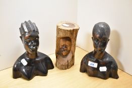 A 20th Century folk art style drift wood facial carving, measuring 18cm high, and two African