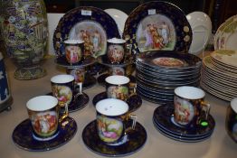 A Royal Vienna porcelain part coffee set, comprising nine cups, eleven saucers, twelve side
