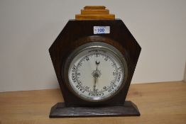 An early 20th Century oak barometer of Art Deco design