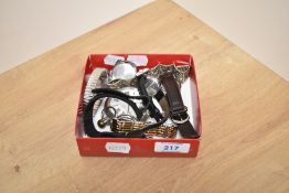 A selection of wristwatches comprising Nike, Timex, Sekonda, Rotary and Bucherer, along with a white