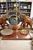 A set of Victorian beam balance apothecary scales, inscribed for T.M Smirk of Newcastle, raised upon