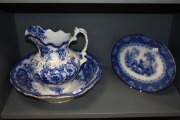 A 19th Century English blue and white toilet jug and bowl set, transfer printed with a foliate