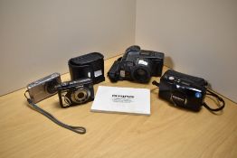 An Olympus AZ-300 Super Zoom camera, together with a selection of other cameras including an Olympus