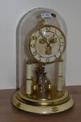 A 20th Century Bentima Anniversary clock, the dial having applied gilt metal Arabic numerals above a