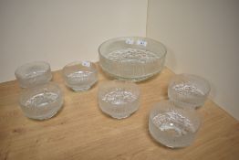 A vintage Ravenhead glass 'Topaz' dessert set, comprising one large bowl and six smaller, each