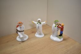 A group of three Coalport Characters 'The Snowman' figures/groups, comprising Adding a Smile, Cowboy