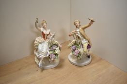 A pair of German Thuringia Schierholz Porcelain figures, modelled as a young male and female both