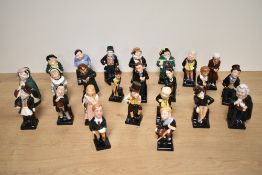A complete set of twenty four Royal Doulton fine bone china Charles Dickens figures including