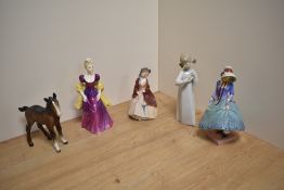 A group of three Royal Doulton bone china figurines, comprising 'Pantalettes' HN1362, 20cm,