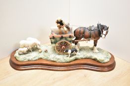 A limited edition Border Fine Arts agricultural group 'Supplementary Feeding' a farmer feeding