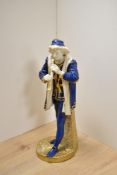 A late 19th/20th century Royal Worcester porcelain figure of a court musician, most likely by
