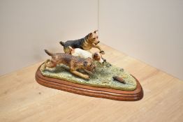 A Border Fine Arts animal group 'Terrier Race' B0242, modelled by modelled by Margaret Turner,