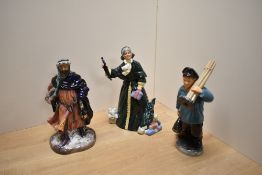 Three Royal Doulton bone china figures comprising Master Sweeper HN2205, Christmas Parcels HN2851