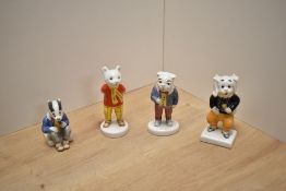 Four Beswick Pottery Rupert And His Friends figures comprising Pong Ping, Algy Pug, Bill Badger