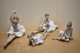 A group of four Nao porcelain ballerina figurines, nicely modelled in various poses, printed marks