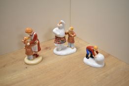 A group of three Coalport Characters 'The Snowman' figure groups, comprising Building The Snowman,