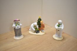 A group of three Coalport Characters 'The Snowman' figure groups, comprising Snowman's Surprise