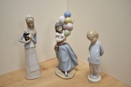 Two Lladro porcelain figurines, comprising Balloon Seller and Punishment, printed marks to base of